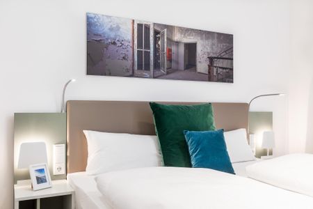 Ferienapartments am Krusespeicher Ferienapartments am Krusespeicher 1-05 Wismar - Schlafzimmer mit Boxspringbett