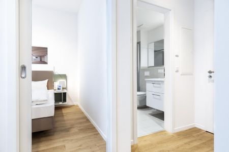 Ferienapartments am Krusespeicher Ferienapartments am Krusespeicher 1-06 Wismar - Wohn-/Essbereich mit Zugang zum Badezimmer