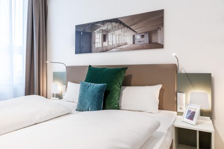 Ferienapartments am Krusespeicher Ferienapartments am Krusespeicher 1-08 Wismar - Schlafzimmer mit Boxspringbett