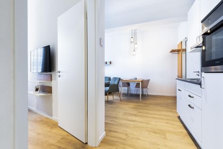 Ferienapartments am Krusespeicher Ferienapartments am Krusespeicher 2-15 Wismar - Wohn-/Essbereich mit Küchenzeile