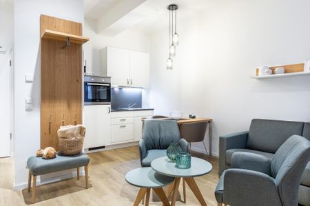 Ferienapartments am Krusespeicher Ferienapartments am Krusespeicher 2-16 Wismar - Wohn-/Essbereich mit Sitzgelegenheit