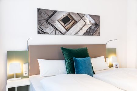 Ferienapartments am Krusespeicher Ferienapartments am Krusespeicher 2-18 Wismar - Schlafzimmer mit Boxspringbett