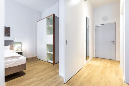 Ferienapartments am Krusespeicher Ferienapartments am Krusespeicher 3-25 Wismar - Wohn-/Essbereich mit Zugang zum Schlafzimmer