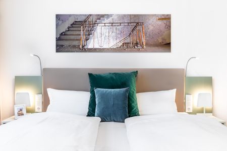 Ferienapartments am Krusespeicher Ferienapartments am Krusespeicher 3-26 Wismar - Wohn-/Schlafbereich mit Boxspringbett