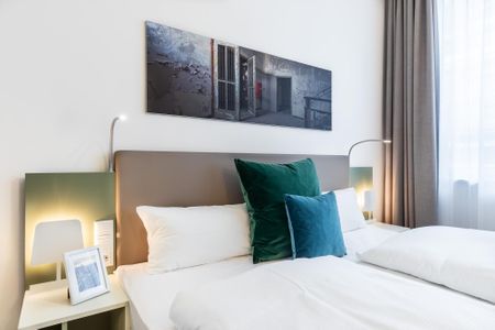 Ferienapartments am Krusespeicher Ferienapartments am Krusespeicher 3-27 Wismar - Wohn-/Schlafbereich mit Boxspringbett