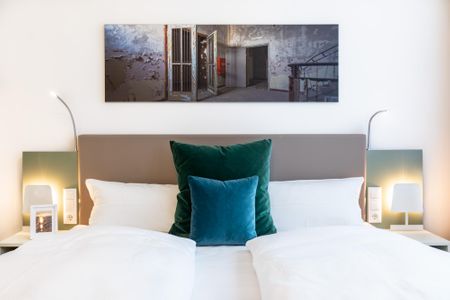 Ferienapartments am Krusespeicher Ferienapartments am Krusespeicher 3-27 Wismar - Wohn-/Schlafbereich mit Boxspringbett