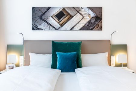 Ferienapartments am Krusespeicher Ferienapartments am Krusespeicher 3-28 Wismar - Wohn-/Schlafbereich mit Boxspringbett