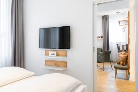 Ferienapartments am Krusespeicher Ferienapartments am Krusespeicher 1-09 Wismar - Schlafzimmer mit Flatscreen-TV