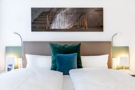 Ferienapartments am Krusespeicher Ferienapartments am Krusespeicher 1-12 Wismar - Wohn-/Schlafbereich mit Boxspringbett