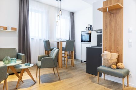 Ferienapartments am Krusespeicher Ferienapartments am Krusespeicher 2-19 Wismar - Wohn-/Essbereich mit Garderobe