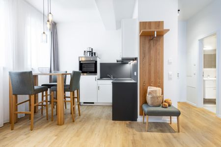 Ferienapartments am Krusespeicher Ferienapartments am Krusespeicher 2-19 Wismar - Wohn-/Essbereich mit Küchenzeile