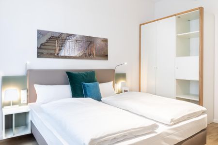 Ferienapartments am Krusespeicher Ferienapartments am Krusespeicher 2-20 Wismar - Schlafzimmer mit Boxspringbett