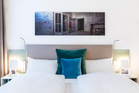 Ferienapartments am Krusespeicher Ferienapartments am Krusespeicher 2-22 Wismar - Wohn-/Schlafbereich mit Boxspringbett