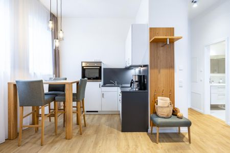 Ferienapartments am Krusespeicher Ferienapartments am Krusespeicher 3-30 Wismar - Wohn-/Essbereich mit Garderobe