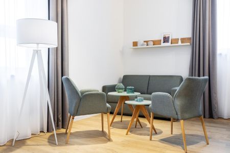 Ferienapartments am Krusespeicher Ferienapartments am Krusespeicher 3-30 Wismar - Wohn-/Essbereich mit Einzelschlafcouch
