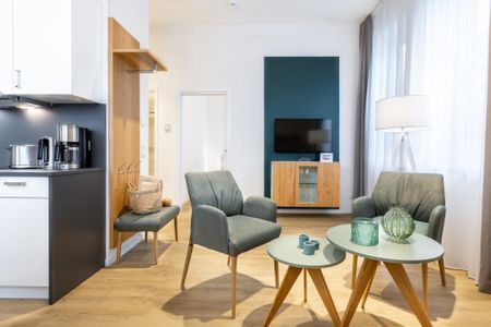 Ferienapartments am Krusespeicher Ferienapartments am Krusespeicher 3-30 Wismar - Wohn-/Essbereich mit Sitzgelegenheit