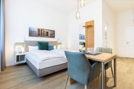 Ferienapartments am Krusespeicher Ferienapartments am Krusespeicher 3-31 Wismar - Wohn-/Schlafbereich mit Boxspringbett