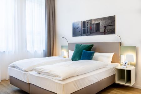 Ferienapartments am Krusespeicher Ferienapartments am Krusespeicher 3-31 Wismar - Wohn-/Schlafbereich mit Boxspringbett