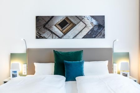Ferienapartments am Krusespeicher Ferienapartments am Krusespeicher 3-33 Wismar - Wohn-/Schlafbereich mit Boxspringbett