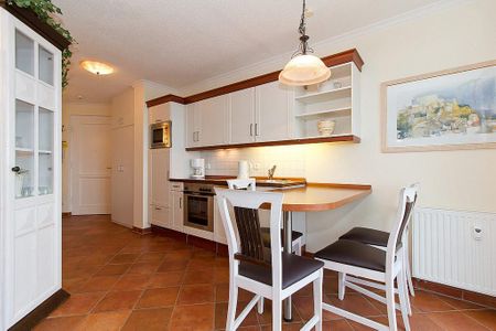 Apartmenthaus Atlantik Apartmenthaus Atlantik 312 Kühlungsborn - Küchenzeile mit Esstisch und Sitzgelegenheit