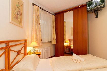 Apartmenthaus Atlantik Apartmenthaus Atlantik 312 Kühlungsborn - Schlafzimmer mit Doppelbett