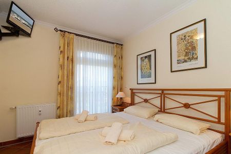 Apartmenthaus Atlantik Apartmenthaus Atlantik 314 Kühlungsborn - Schlafzimmer mit Doppelbett