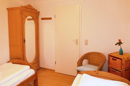 Urlauberdorf Urlauberdorf 32b Boltenhagen - Schlafzimmer mit zwei Einzelbetten und Kleiderschrank