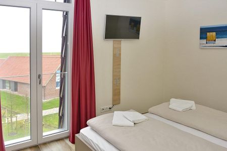 Resort Deichgraf Resort Deichgraf 27-14 Wremen - Schlafzimmer mit Doppelbett