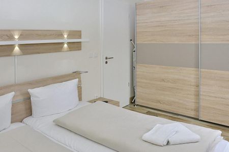 Resort Deichgraf Resort Deichgraf 27-14 Wremen - Schlafzimmer mit Doppelbett