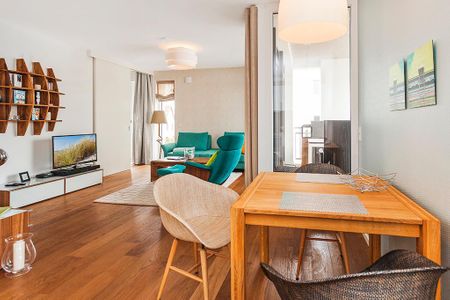 DünenResort Binz DünenResort Binz 128 Rügen - Wohn-Essbereich mit Esstisch und Sitzgelegenheit