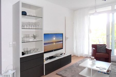 DünenResort Binz DünenResort Binz 135 Rügen - Wohn-Essbereich mit Couch