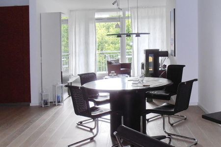 DünenResort Binz DünenResort Binz 135 Rügen - Wohn-Essbereich mit Esstisch und Sitzgelegenheit