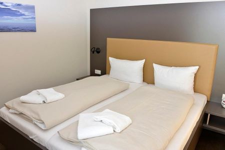 Resort Deichgraf Resort Deichgraf 27-13 Wremen - Schlafzimmer mit Doppelbett