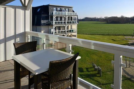 Resort Deichgraf Resort Deichgraf 27-13 Wremen - Balkon mit Gartenmöbeln