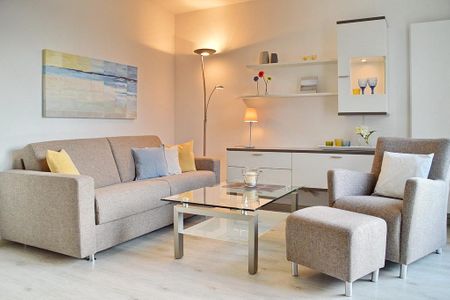 Residenz Seestern Residenz Seestern 2-31 Boltenhagen - Wohnzimmer mit Couch und Sessel