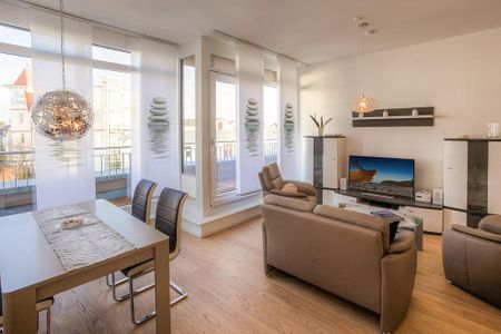 DünenResort Binz DünenResort Binz 435 Rügen - Wohn-Essbereich mit Couch