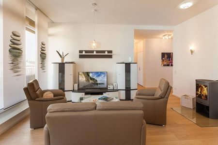 DünenResort Binz DünenResort Binz 435 Rügen - Wohn-Essbereich mit Couch