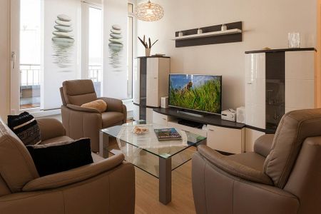 DünenResort Binz DünenResort Binz 435 Rügen - Wohn-Essbereich mit Couch