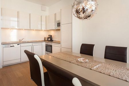DünenResort Binz DünenResort Binz 435 Rügen - Wohn-Essbereich mit Esstisch und Sitzgelegenheit