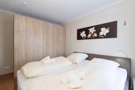 Apartmenthaus Atlantik Apartmenthaus Atlantik 213 Kühlungsborn - Schlafzimmer mit Doppelbett