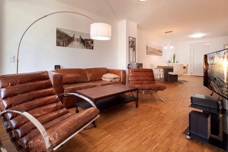DünenResort Binz DünenResort Binz 115 Rügen - Wohn-Essbereich mit Couch