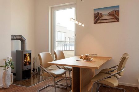 DünenResort Binz DünenResort Binz 436 Rügen - Wohn-Essbereich mit Esstisch und Sitzgelegenheit