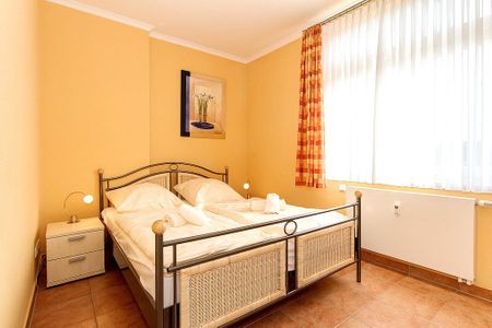 Dünenschloss Dünenschloss 1-32 Kühlungsborn - Schlafzimmer mit Doppelbett