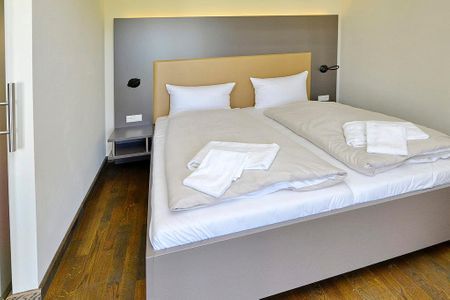 Resort Deichgraf Resort Deichgraf 31-02 Wremen - Schlafzimmer mit Doppelbett