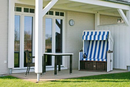 Resort Deichgraf Resort Deichgraf 31-02 Wremen - Terrasse mit Gartenmöbeln