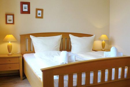 Haus am Park Haus am Park 30 Kühlungsborn - Schlafzimmer mit Doppelbett