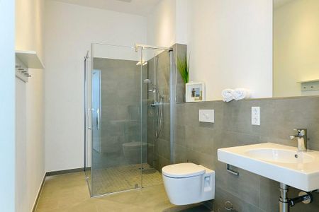 Aparthotel Anna Düne Aparthotel Anna Düne 0-06 Wangerooge - Badezimmer mit Dusche, WC und Waschtisch