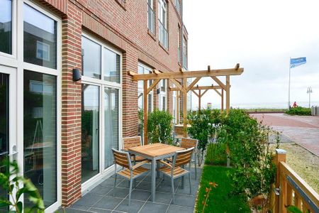 Aparthotel Anna Düne Aparthotel Anna Düne 0-10 Wangerooge - Terrasse mit Gartenmöbel