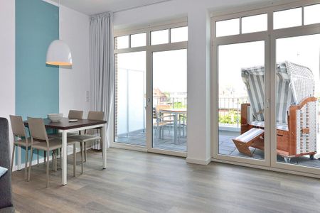 Aparthotel Anna Düne Aparthotel Anna Düne 1-13 Wangerooge - Wohn/ Essbereich mit Esstisch