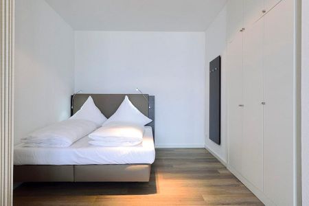 Aparthotel Anna Düne Aparthotel Anna Düne 1-19 Wangerooge - Schlafzimmer mit Doppelbett im Wohnbereich